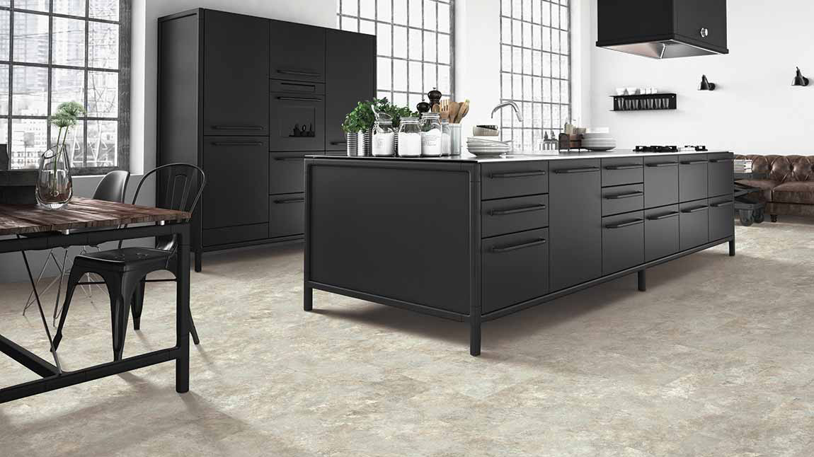 Luxury vinyl flooring in a kitchen, installation services available.